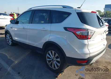 2017 Ford Escape Titanium z USA, uszkodzony, nr VIN 1FMCU0JD2HUB52235
